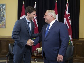 Prime Minister Justin Trudeau meets with Ontario Premier Doug Ford at Queens Park in Toronto on July 5, 2018, shortly after Ford's election. The premier became a frequent target of Trudeau's during the 2019 federal election.