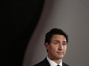 Liberal Leader Justin Trudeau listens to questions during a press conference following the leaders debate in Gatineau, Que., on Oct. 7, 2019
