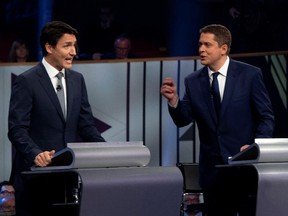 Liberal leader Justin Trudeau and Conservative leader Andrew Scheer take part in the Federal leaders French language debate in Gatineau, Quebec, Canada, October 10, 2019.