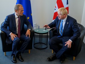 Donald Tusk (L), President of the European Council, and British Prime Minister Boris Johnson meet at the United Nations Headquarters in New York, U.S. September 23, 2019.