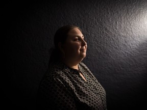 Amy Amantea, who lost her eyesight due to complications while undergoing surgery more than a decade ago, poses for a photograph at her home in North Vancouver, on Friday October 11, 2019.