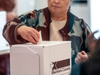 A woman votes in the federal election on Oct. 21, 2019.