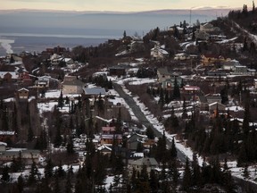 Residential homes stand on the outskirts of Anchorage, Alaska, U.S., on Wednesday, Nov. 5, 2014.