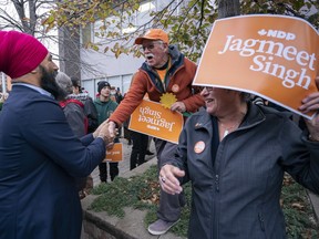 NDP Leader Jagmeet Singh greets a supporter as he arrives for a rally in Saskatoon on Friday, October 4, 2019.