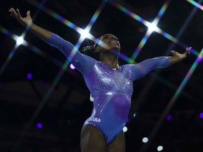 USA's Simone Biles performs to win the floor event during the apparatus finals at the FIG Artistic Gymnastics World Championships at the Hanns-Martin-Schleyer-Halle in Stuttgart, southern Germany, on October 13, 2019.