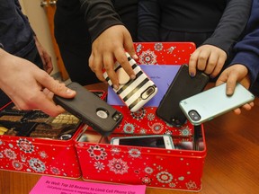 Frontenac Secondary School students put their cellphones away in the schools new classroom tins, initiated in March 2018, to help students detach from the cellphones during class time.