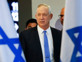 Israeli Kahol Lavan (Blue and White) political alliance leader and retired General Benny Gantz, arrives to give a statement ahead of a midnight deadline in the coastal city of Tel Aviv on November 20, 2019.