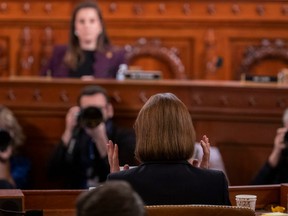 Fiona Hill, former National Security Council Russia expert, bottom centre, speaks during a House Intelligence Committee impeachment inquiry hearing in Washington, DC on November 21, 2019.