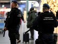 Dutch police patrol at Amsterdam's Schiphol airport after a suspicious incident proved to be a false alarm.