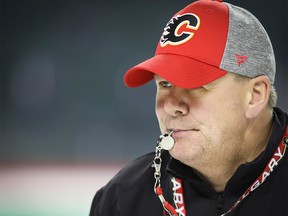 Calgary Flames head coach Bill Peters during practice at the Scotiabank Saddledome in Calgary on April 9, 2019.