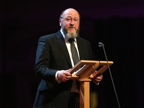 In this file photo taken on Jan. 27, 2015 Chief Rabbi Ephraim Mirvis gives a speech during a Holocaust Memorial Day ceremony at Central Hall Westminster in London.