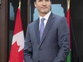 Canadian Prime Minister Justin Trudeau is seen in his office before meeting with King Abdullah II of Jordan on Parliament Hill in Ottawa, Monday November 18, 2019.