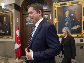 Leader of the Opposition Andrew Scheer and Deputy leader Leona Alleslev enter the Foyer of the House of Commons to speak with the media, Thursday November 28, 2019 in Ottawa.