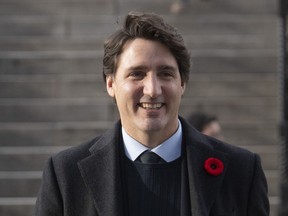 Canadian Prime Minister Justin Trudeau walks to a Liberal caucus meeting in Ottawa, Thursday, November 7, 2019.