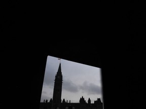 A group of digital disruptors inside the federal government are testing a way to send tens of millions of e-notifications each month to save workers -- and taxpayers -- time and money. The Peace Tower is seen in Ottawa, Wednesday, Nov. 27, 2019.