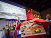 Fans, including one dressed as a lobster, cheer as the Canadian Football League announces that Halifax’s CFL team will be called the Atlantic Schooners, during an event at Grey Cup week, in Edmonton on Nov. 23, 2018.