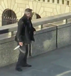 A man holds a knife taken from the attacker, after a fatal stabbing spree at London Bridge.