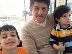 Eddie Bastidas, with his sons Jonathan and Nicolas.