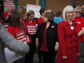 President of the BC Teacher's Federation Teri Mooring joins teachers who are protesting outside the BC NDP Convention where Premier John Horgan and Federal NDP Leader Jagmeet Singh will be speaking at the Victoria Convention Centre in Victoria, Saturday, Nov. 23, 2019.