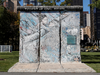 A portion of the Berlin Wall stands in the garden of the United Nations headquarters in New York.