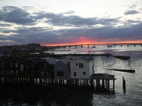 The Cross Bay Bridge linking Rockaways to the Broad Channel neighborhood of Queens is seen at sunset in New York City, U.S., November 2, 2019.