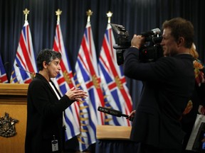 Vancouver Coastal Health officer Dr. Meena Dawar is interviewed by the press following a provincial announcement regarding regulations to restrict vapour product access, flavours, nicotine content, packaging and advertising to help protect youth from risks associated with vaping during a press conference at Legislature in Victoria, B.C., on Thursday, November 14, 2019.