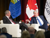 Former prime ministers Jean Chrétien and Stephen Harper at an event in Calgary on Nov. 1, 2019.