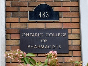 A sign for the Ontario College of Pharmacists is seen at its headquarters in Toronto on Friday, Nov. 1, 2019. The college was holding a disciplinary hearing into pharmacist Jason Newman, of London. Ont., who was accused of misconduct in how he dispensed the anti-opioid drug naloxone.