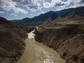 The site of a massive rock slide is seen on the Fraser River near Big Bar, west of Clinton, B.C., on Wednesday July 24, 2019. Ottawa is seeking help to avoid what it says could be the extinction of some British Columbian salmon species because of a massive landslide on the Fraser River that sparked a co-ordinated emergency response this year.