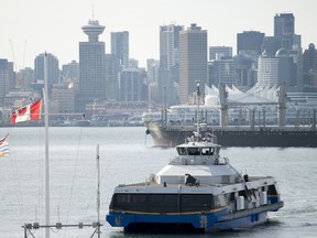 A seabus is pictured as it crosses Vancouver harbour with downtown Vancouver pictured in the background Wednesday, October, 30, 2019. The union representing almost 5,000 Metro Vancouver transit employees announces the next steps in its job action against Coast Mountain Bus Company today as drivers resume an overtime ban, potentially affecting many busy bus routes.