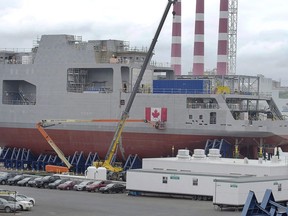 Two of the three mega-blocks of the future Canadian naval ship  Harry DeWolf are seen at the Halifax Shipyard in Halifax on Tuesday, July 18, 2017. The delivery date for the navy's first Arctic and Offshore Patrol Ship has been pushed back again.