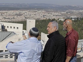 Israeli Prime Minister Benjamin Netanyahu, centre, meets with heads of Israeli settlement authorities at the Alon Shvut settlement, in the Gush Etzion block, in the occupied the West Bank, Tuesday, Nov. 19, 2019. Canada has affirmed it does not share the Trump administration's view that Israel's settlements in the West Bank are in fact legal under international law.