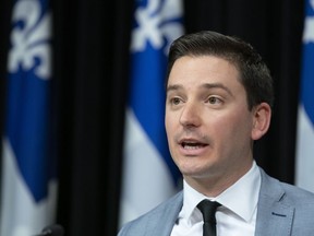 Quebec Minister of Immigration, Diversity and Inclusiveness Simon Jolin-Barrette speaks at a news conference at the legislature in Quebec City on March 28, 2019. The bad news for Quebec's immigration minister continues to pile up with the news documents he forgot in his government vehicle were stolen from the parking lot of a legislative building. Minister Simon Jolin-Barrette confirmed to reporters today the files taken from his car were working documents and they weren't confidential.