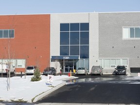 A building is shown in an industrial park in Montreal, Thursday, Nov. 21, 2019, where it is believed that children attend a school run by a religious group.