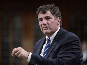 Intergovernmental Affairs Minister Dominic LeBlanc rises during question period in the House of Commons on Parliament Hill, in Ottawa on October 4, 2018. Re-elected Liberal and former federal cabinet minister Dominic LeBlanc has been discharged from a Montreal hospital following a successful stem cell transplant. LeBlanc said in a statement today he was feeling stronger and looking forward to returning to New Brunswick, where he was re-elected for the seventh consecutive time Oct. 21 to represent the riding of Beausejour.