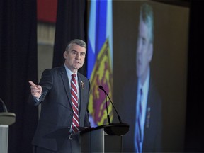 Premier Stephen McNeil delivers the state-of-the-province speech at a business luncheon in Halifax on Wednesday, Feb. 7, 2018. Nova Scotia's premier is defending his latest trade mission to China as two Canadians detained by the economic giant approach one year behind bars.