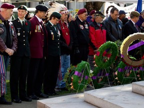 Veterans gather at the Victory Square Cenotaph for a National Aboriginal Veterans Day ceremony in Vancouver, B.C., on Friday November 8, 2013. A special ceremony recognizing Metis contributions to Canada's Second World War effort is being held in the nation's capital today on the eve of Remembrance Day.