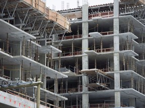 British Columbia's rental housing crisis goes far beyond factoring the impact of short-term rentals, say housing experts who urge more building across the province is needed to help families find affordable homes. New condo buildings are shown under construction in downtown Vancouver, Wednesday, Feb. 8, 2017.