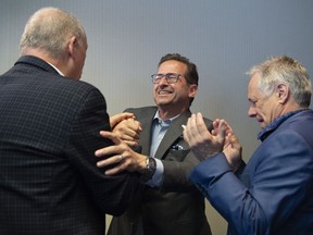 Bloc Quebecois Leader Yves-Francois Blanchet, centre, greets new Bloc MPs as he arrives at first party caucus in Quebec City, Thursday, Oct. 24, 2019. The Bloc Quebecois leader will meet with the prime minister today in Ottawa, a day after Justin Trudeau had back-to-back meetings with Conservative Opposition Leader Andrew Scheer and Saskatchewan Premier Scott Moe.