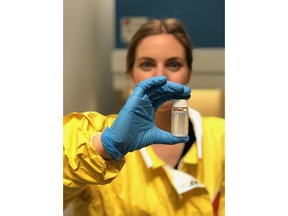 A pioneering study of seven beluga whales in Canada's remote Arctic waters has found microplastics in the innards of every single one. Ocean Wise researcher and Simon Fraser University masters student Rhiannon Moore shows a vial of microplastics at the Ocean Wise Plastics Lab in Vancouver in a November 2019 handout photo.