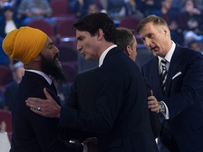 Liberal Leader Justin Trudeau and NDP Leader Jagmeet Singh shake hands following the Federal Leaders French language debate in Gatineau, Que., Thursday, Oct. 10, 2019.