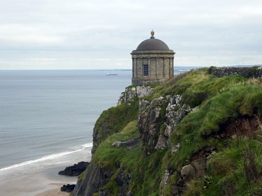 Mussenden Temple overlooks the beach and ocean.