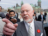 Don Cherry talks with reporters outside the Parliament buildings in Ottawa, Nov. 7, 2006.