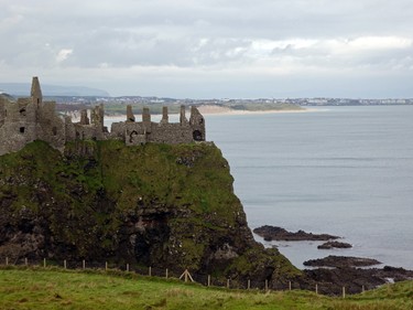 Dunluce Castle is perched on a rocky headland.