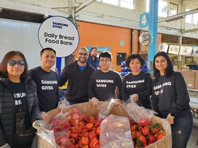Samsung employees volunteer with the Daily Bread Food Bank during this year's Day of Giving.