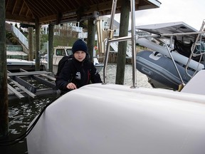 Swedish climate activist Greta Thunberg, 16, steps aboard the catamaran La Vagabonde as she sets sail for Europe in Hampton, Va., on Nov. 13, 2019.