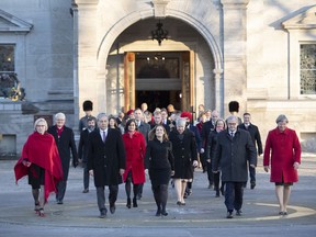 Members of the federal cabinet walk through the forecourt at Rideau Hall after a swearing in ceremony in Ottawa, on Wednesday, Nov. 20, 2019.