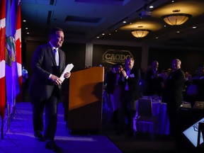 Alberta Premier Jason Kenney leaves to podium to a standing ovation after speaking to the Canadian Association of Oilwell Drilling Contractors meeting in Calgary, Alta., Wednesday, Nov. 13, 2019.THE CANADIAN PRESS/Jeff McIntosh