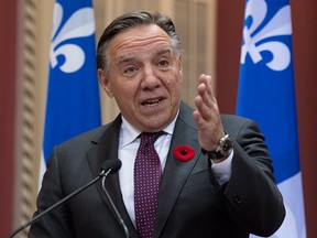 Quebec Premier Francois Legault speaks at the legislature in Quebec City on  Oct. 30, 2019. Legault has suggested that only 'historic Anglophones' should expect to receive government services in English.