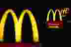 Illuminated golden arches mark the entrance to a McDonald's Corp. restaurant in Shelbyville, Kentucky, U.S., on Friday, Jan. 23, 2015. McDonald's Corp., the world's largest restaurant chain, posted same-store sales that declined less than analysts expected as menu changes started to turn around results in the U.S. Photographer: Luke Sharrett/Bloomberg